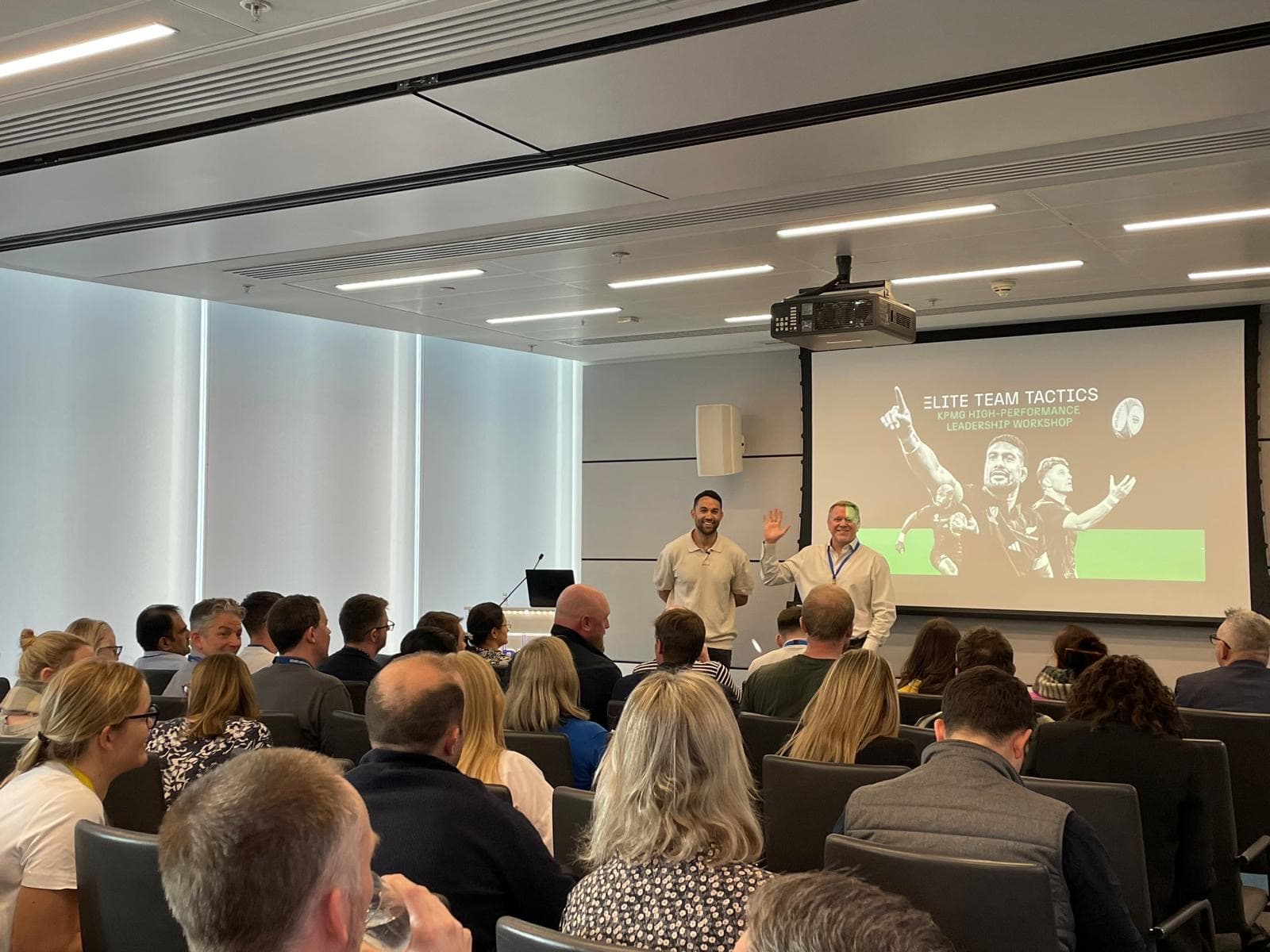 Alex Ayin speaking at an event